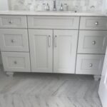 White cabinetry inside a bathroom