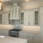 A beautiful kitchen with white designs