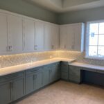 Kitchen cabinetry with underlighting