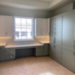 A room with numerous cabinets
