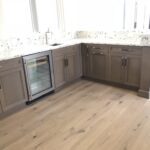 Kitchen cabinets with a wine cooler