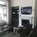 A modern living room with a mounted television