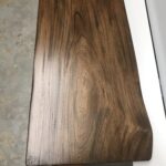 A dark wooden plank